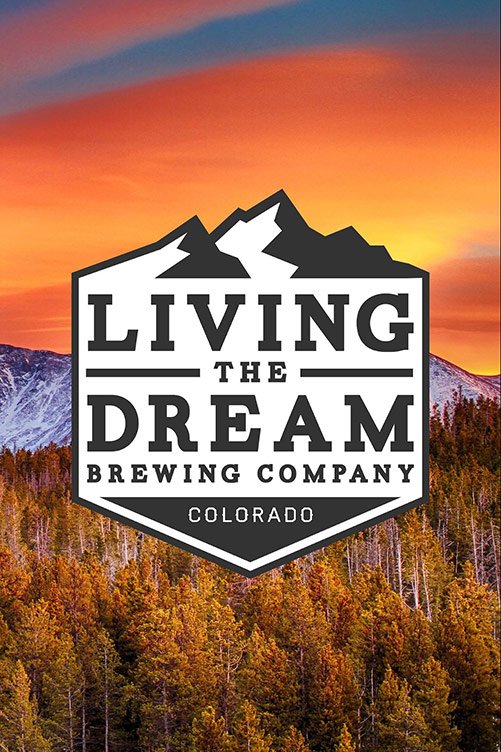 Living The Dream Brewing Company logo over Colorado mountainscape sunset